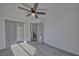 Bedroom with carpeted floors, open doorway, and closet with sliding doors at 384 E Erin St # 3, Pahrump, NV 89048