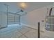 Spacious two car garage with concrete flooring and an electric water heater at 384 E Erin St # 3, Pahrump, NV 89048