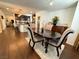 Dining room featuring hardwood floors and an entrance to the open-concept kitchen at 384 Gracious Way, Henderson, NV 89011