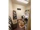 Efficient laundry room with modern washer and dryer, shelving, and stylish decor at 384 Gracious Way, Henderson, NV 89011