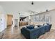 Spacious living room features recessed lighting, ceiling fan, and wood flooring at 3925 Champagne Wood Dr, North Las Vegas, NV 89031