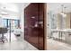Modern bathroom featuring marble walls, glass shower and stylish vanity that combine luxury with contemporary design at 4381 W Flamingo Rd # 2504, Las Vegas, NV 89103