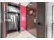 Organized storage with open closet and safe, adjacent to a bright service door and modern refrigerator at 4381 W Flamingo Rd # 2504, Las Vegas, NV 89103
