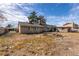 Expansive backyard featuring a patio area, mature trees, and potential for outdoor entertaining at 4726 Idaho Ave, Las Vegas, NV 89104