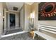 Open entryway showcasing tile flooring, neutral wall color, and unique decorative art at 4726 Idaho Ave, Las Vegas, NV 89104