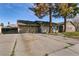 Features a spacious driveway leading to an attached two-car garage, enhancing convenience at 4726 Idaho Ave, Las Vegas, NV 89104