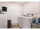 Laundry room with a new washer and dryer at 4726 Idaho Ave, Las Vegas, NV 89104