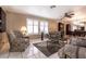 Spacious living room with tile floors, plantation shutters and traditional furnishings at 4726 Idaho Ave, Las Vegas, NV 89104