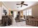 Bright living room filled with natural light, tile flooring, and traditional furnishings at 4726 Idaho Ave, Las Vegas, NV 89104