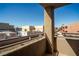 Balcony view with a view of a parking area and buildings at 4730 E Craig Rd # 2190, Las Vegas, NV 89115