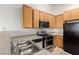 Well-equipped kitchen features stainless steel appliances and ample counter space at 4730 E Craig Rd # 2190, Las Vegas, NV 89115