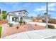 Charming two-story home with a well-manicured front yard, and a three car garage at 511 Beaconwood St, Henderson, NV 89052