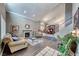 Bright living room boasting a fireplace, modern decor, and stairs to the second level at 511 Beaconwood St, Henderson, NV 89052