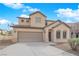 Inviting two-story home with attached garage, landscaped yard and covered porch at 5124 Veeder Crest St, North Las Vegas, NV 89081