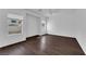 Spacious main bedroom with hardwood floors, multiple windows, and ceiling fan at 5124 Veeder Crest St, North Las Vegas, NV 89081