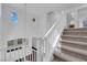 Bright staircase with large windows offering ample natural light at 5124 Veeder Crest St, North Las Vegas, NV 89081
