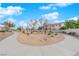 Picturesque community walking path meanders through manicured landscaping, perfect for strolls and outdoor enjoyment at 5124 Veeder Crest St, North Las Vegas, NV 89081