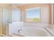 Bright bathroom with walk-in shower and soaking tub at 63 Crescent Palm Ct, Henderson, NV 89002