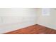 Walk-in closet with wood-look floor and shelving at 63 Crescent Palm Ct, Henderson, NV 89002