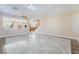 Spacious living room featuring lots of natural light, neutral tones, and an open floor plan at 63 Crescent Palm Ct, Henderson, NV 89002