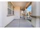 Inviting covered porch with elegant columns, offering a welcoming entrance to the home at 63 Crescent Palm Ct, Henderson, NV 89002