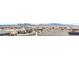 Panoramic aerial view showcasing the neighborhood's layout, nearby mountains, and community landscape at 6637 Rockhouse St, North Las Vegas, NV 89086