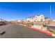 Exterior image of the community entrance, featuring signage, landscaping, and a decorative gate for secure access at 6637 Rockhouse St, North Las Vegas, NV 89086