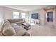 Second floor loft area featuring large sectional seating, a media center, and plenty of room for entertaining at 6637 Rockhouse St, North Las Vegas, NV 89086