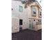View of backyard with neutral color scheme, a concrete patio and low maintenance desert landscaping at 6965 Coral Rock Dr, Las Vegas, NV 89108