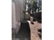 Backyard featuring a concrete patio for outdoor entertaining and low maintenance desert landscaping at 6965 Coral Rock Dr, Las Vegas, NV 89108