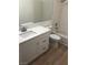 Bathroom featuring a modern vanity, tile backsplash, and sleek fixtures at 6965 Coral Rock Dr, Las Vegas, NV 89108