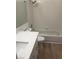 Clean bathroom design with modern vanity, shower/tub combo, and neutral finishes at 6965 Coral Rock Dr, Las Vegas, NV 89108