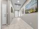 Bright hallway with white doors and neutral paint throughout the home at 71 Gosia Grove Ave, North Las Vegas, NV 89031
