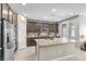 Modern kitchen with granite countertops, stainless steel appliances, and ample cabinet space at 71 Gosia Grove Ave, North Las Vegas, NV 89031