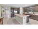 Spacious kitchen featuring a large island, stainless steel appliances, and custom cabinets at 71 Gosia Grove Ave, North Las Vegas, NV 89031