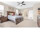 Relaxing main bedroom featuring a king-sized bed, dresser, and calming decor for peaceful nights at 71 Gosia Grove Ave, North Las Vegas, NV 89031
