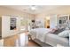 Cozy bedroom featuring a desk, ensuite bathroom, and a balcony with plenty of natural light at 837 Roseberry Dr, Las Vegas, NV 89138