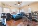 Inviting bedroom featuring sports themed decorations, wood floors, and lots of space for activities at 837 Roseberry Dr, Las Vegas, NV 89138