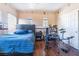 Fun bedroom featuring sports themed decorations, wood floors, and lots of natural light at 837 Roseberry Dr, Las Vegas, NV 89138