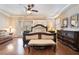 Charming main bedroom with hardwood floors, a large bed, and matching furniture at 837 Roseberry Dr, Las Vegas, NV 89138
