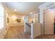 Bonus room featuring recessed lighting, built-in shelving, and wood-look flooring at 8446 Vacarez Dr, Las Vegas, NV 89149
