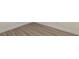 Close up of the luxury vinyl plank flooring with white baseboards at 8446 Vacarez Dr, Las Vegas, NV 89149