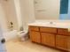 Functional bathroom featuring a single sink vanity, a standard toilet, and a shower-tub combination at 9299 Adamshurst Ave, Las Vegas, NV 89148