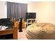 Bedroom featuring a twin bed and a large beanbag chair at 9299 Adamshurst Ave, Las Vegas, NV 89148