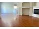 Bright living room with hardwood floors, fireplace, and an open layout perfect for entertaining at 9299 Adamshurst Ave, Las Vegas, NV 89148