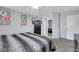 Comfortable bedroom features neutral walls, a ceiling fan, and a TV for your relaxation and viewing pleasure at 10218 Maltese Cross Ct, Las Vegas, NV 89183