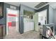 Upstairs laundry room tucked between bedrooms at 10218 Maltese Cross Ct, Las Vegas, NV 89183