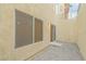 Low maintenance backyard with gravel and stucco wall at 11002 Inverlochy Ct, Las Vegas, NV 89141