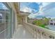 Balcony shows detailed columns and a view of the surrounding homes and neighborhood landscaping at 11002 Inverlochy Ct, Las Vegas, NV 89141
