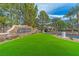 Stone Royal Highlands community entrance sign with professionally landscaped grass, plants and foliage at 11002 Inverlochy Ct, Las Vegas, NV 89141